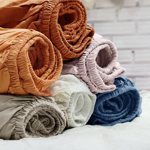 Our linen fitted sheets are available in a range of colors and sizes, making them a perfect fit for any bed. The natural linen fibers allow your skin to breathe, keeping you cool in the summer and warm in the winter.