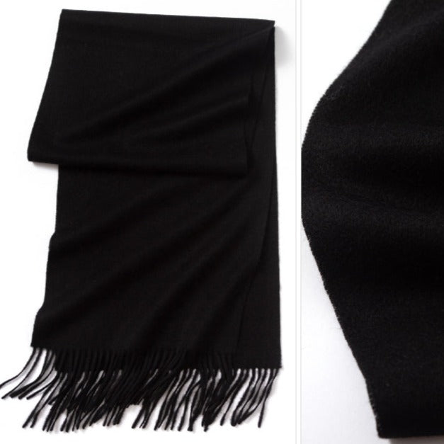 Black merino wool scarf |The scarf is made from high-quality merino wool, ensuring maximum warmth and comfort on even the coldest days. The generous length provides ample coverage, while the tassels add a touch of personality and charm to your outfit.  Available in 12 vibrant and earthy colors, our wool scarf is perfect for adding a pop of color to any outfit. From classic neutrals to bold and bright shades, there's a color to suit every taste and style.