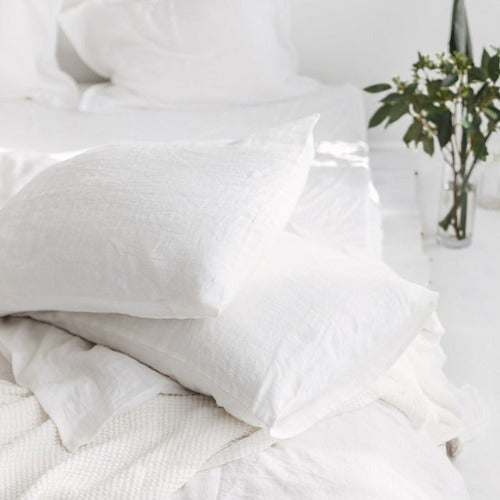 White linen pillow cases and bedding | Upgrade your bedding with our high-quality linen pillowcases and experience the luxury of natural linen every night. Order now and transform your bedroom into a cozy and stylish haven.