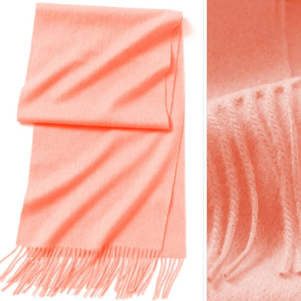 Coral wool scarf | The scarf is made from high-quality merino wool, ensuring maximum warmth and comfort on even the coldest days. The generous length provides ample coverage, while the tassels add a touch of personality and charm to your outfit.  Available in 12 vibrant and earthy colors, our wool scarf is perfect for adding a pop of color to any outfit. From classic neutrals to bold and bright shades, there's a color to suit every taste and style.