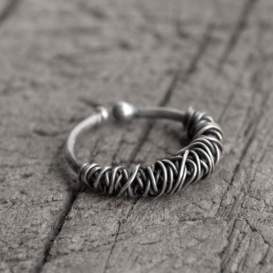 Whether you're dressing up for a special occasion or looking for a stylish accessory to complement your everyday look, this ring is the perfect choice. Shop now to add a touch of sophistication and class to your jewelry collection with our sterling silver wrap ring.