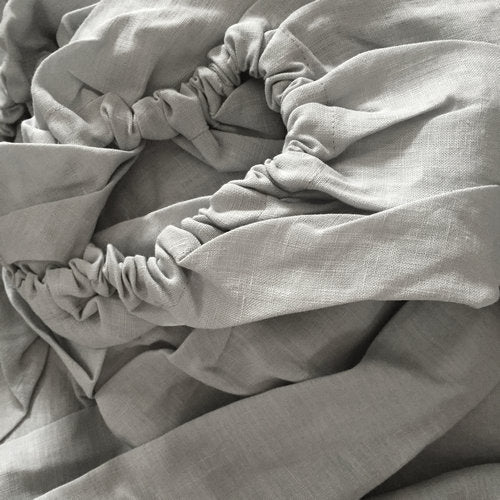 Dove grey linen bedding | Easy to care for, our linen fitted sheets can be machine washed and tumble dried, and they become even softer and more comfortable over time. With a range of colors available, you can mix and match different linen fitted sheets to create a unique and personalized look for your bed.