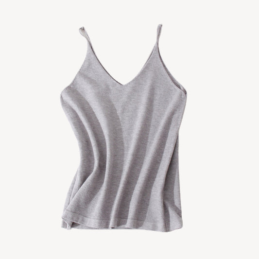 Grey wool tank top | Whether you're heading to the beach or running errands around town, our knit jersey tank top is a must-have for any summer wardrobe. Its timeless style ensures that it will be a wardrobe staple for years to come, while its soft and lightweight material makes it a comfortable choice for everyday wear.