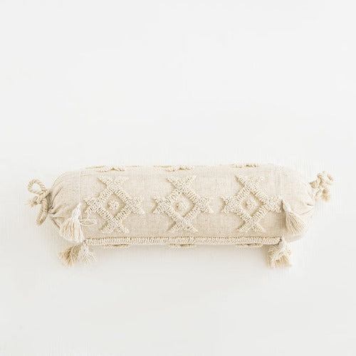 Roll pillow cover in linen | Add a touch of boho chic to your living space with our beautiful tufted throw pillow in natural cotton with tassels. This stunning pillow is crafted from high-quality, 100% natural cotton, providing a soft and comfortable feel that will enhance your home decor.