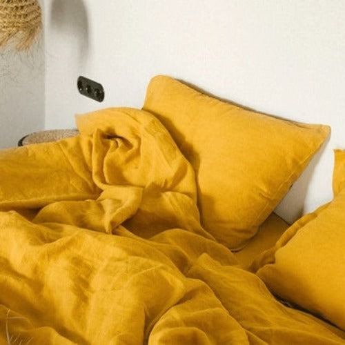 Mustard Yellow linen bedding | With a range of sizes and colors available, you can mix and match different linen pillowcases to create a unique and personalized look for your bed. Whether you're looking for a classic white or a modern shade of gray, we've got you covered.
