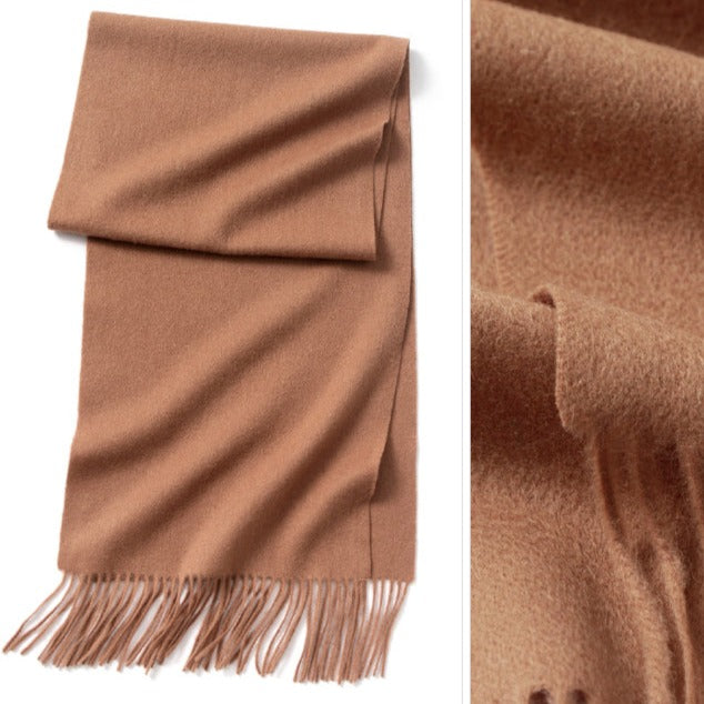 Terracotta wool scarf | Stay cozy and stylish this season with our 100% merino wool scarf. This scarf is not only soft and warm, but also long and stylish, with tassels that add a playful and chic touch.