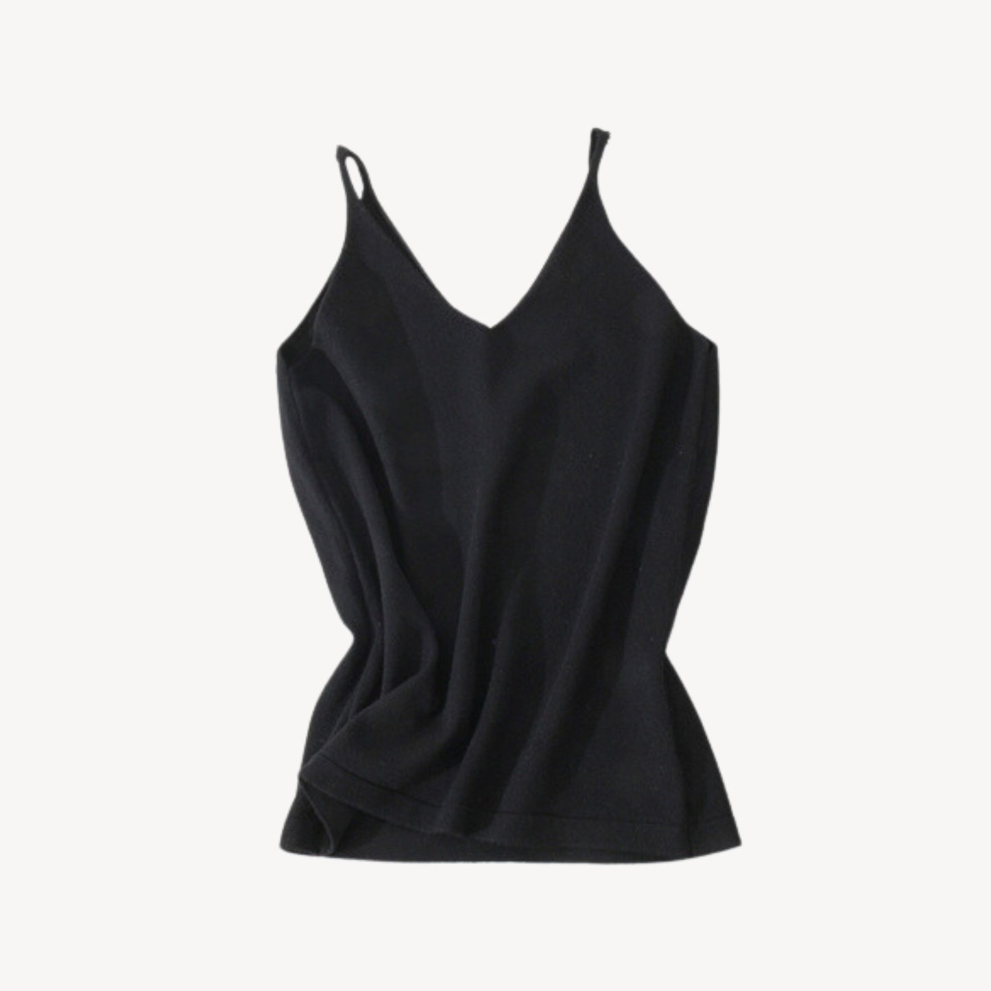 Black wool tank top | Whether you're heading to the beach or running errands around town, our knit jersey tank top is a must-have for any summer wardrobe. Its timeless style ensures that it will be a wardrobe staple for years to come, while its soft and lightweight material makes it a comfortable choice for everyday wear.